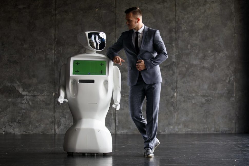 Businessman hangs out with his colleague's human uber | Gennady Danilkin | Shutterstock.com