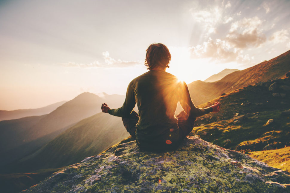 Someone meditating, or someone body hacking--you decide. | Everst | Shutterstock