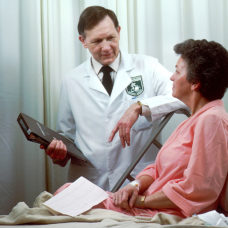 Oncology doctor consults with patient | National Cancer Institute