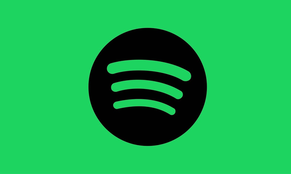 Image shows Spotify's three stripes logo against a green background. 