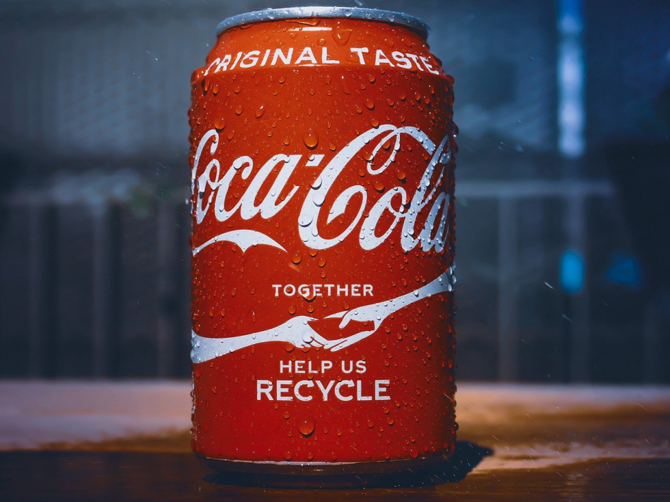 Image shows a can of coca-cola with the message 